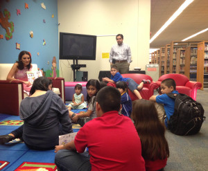 Author Rosa Flores reads her book "Lilia Goes To School" with illustrator Luis Contreras II 